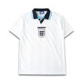 Elite Retro Kits England 1996 home football shirt in white with navy and red collar detailing and Umbro branding.