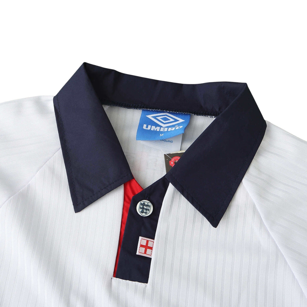 Elite Retro Kits England 1998 home football shirt featuring a navy collar, red placket, and Umbro branding.