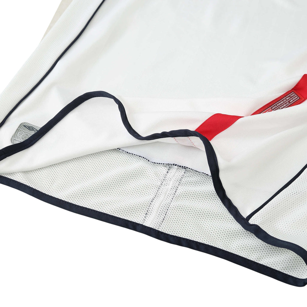 Elite Retro Kits England 2001-03 home shirt featuring white fabric, red trim, and navy blue piping detail.