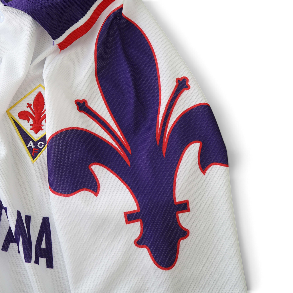 Elite Retro Kits Fiorentina 1995/96 away jersey featuring white fabric, purple giglio crest, and collar detail.