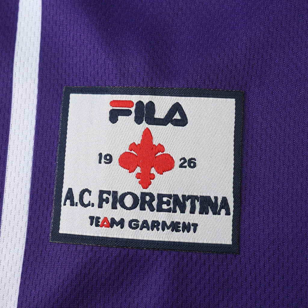 Elite Retro Kits Fiorentina 1999/00 home shirt featuring the iconic red giglio crest and Fila logo on purple fabric