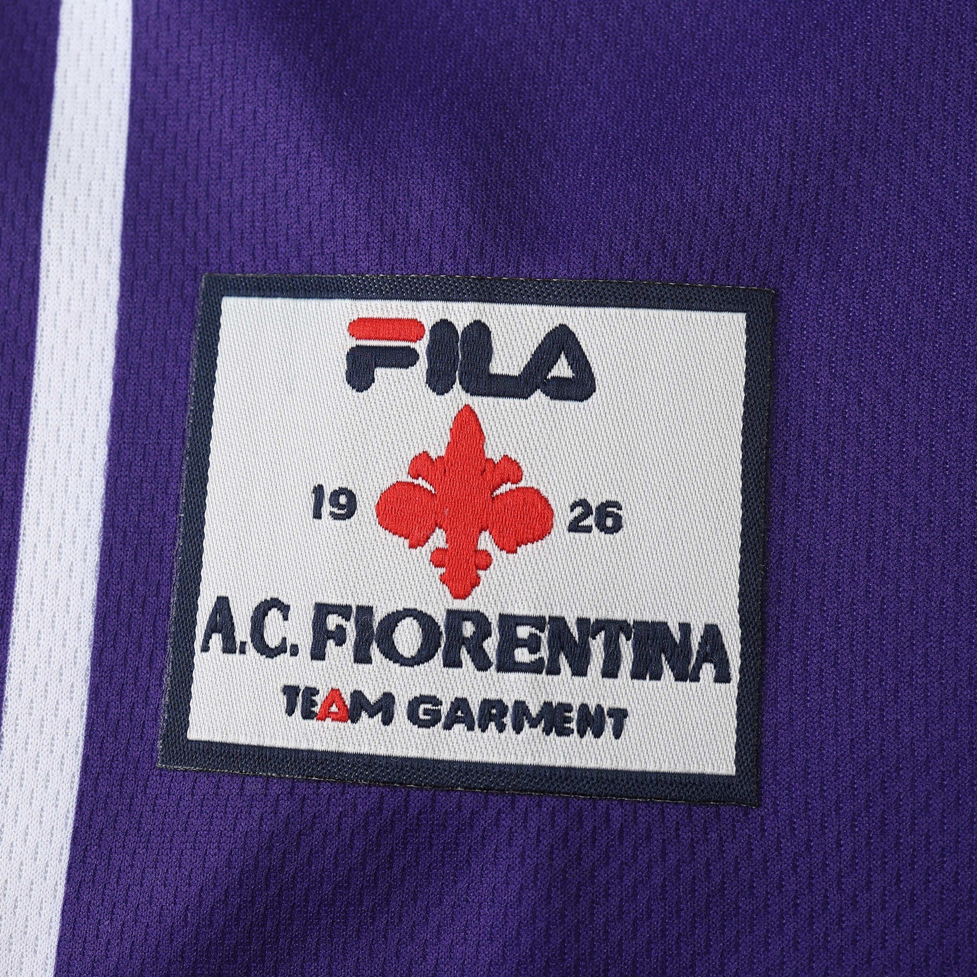 Elite Retro Kits Fiorentina 1999/00 home shirt featuring the iconic red giglio crest and Fila logo on purple fabric