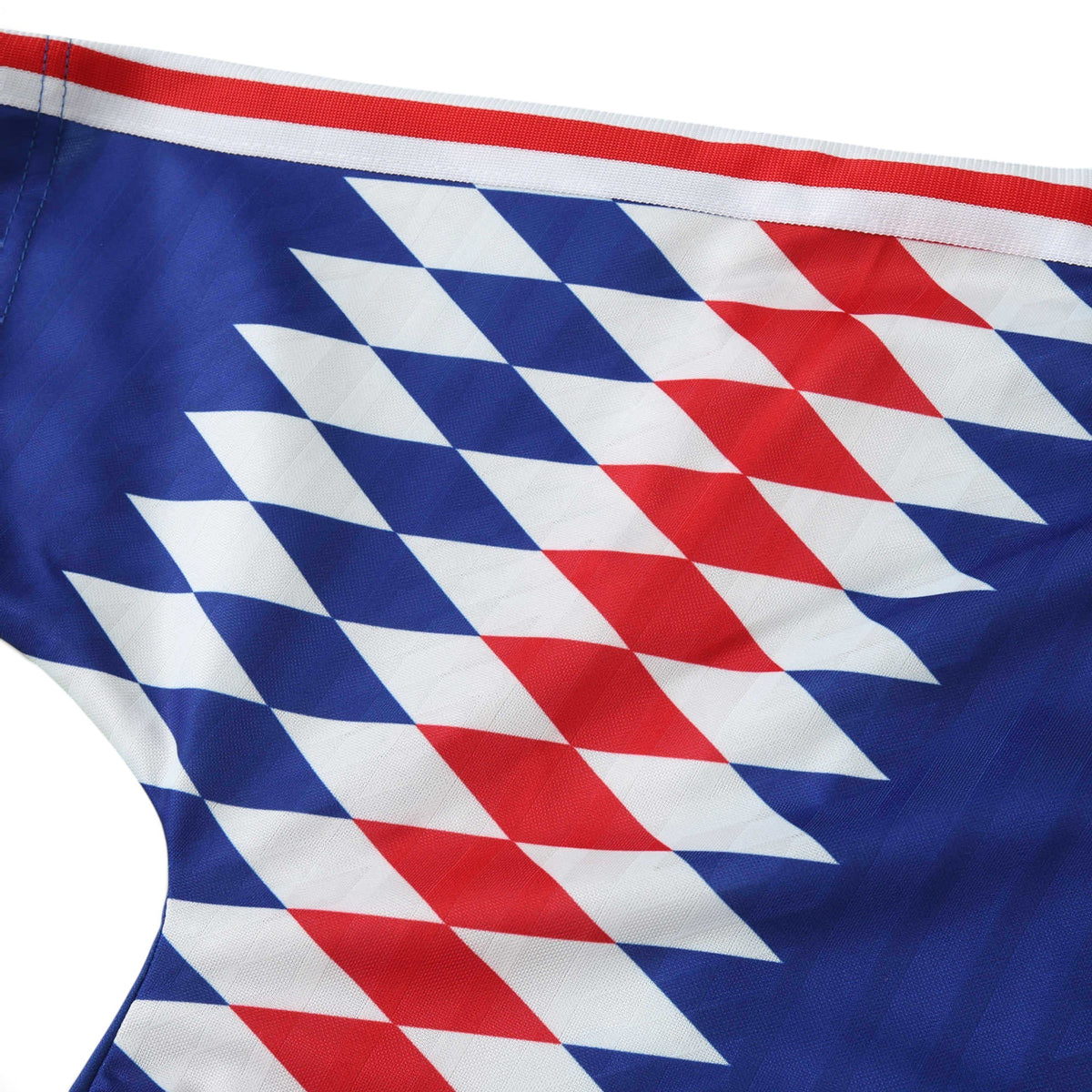 Elite Retro Kits France 1994 home shirt featuring a blue, white, and red diamond pattern on the sleeve and collar.