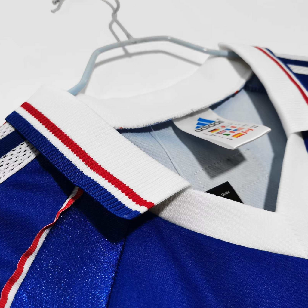 Elite Retro Kits France 1998 World Cup home shirt featuring a white collar with red and blue trim and long sleeves