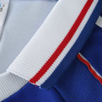 Elite Retro Kits France 1998 World Cup home shirt featuring a white ribbed collar with red and blue striped trim