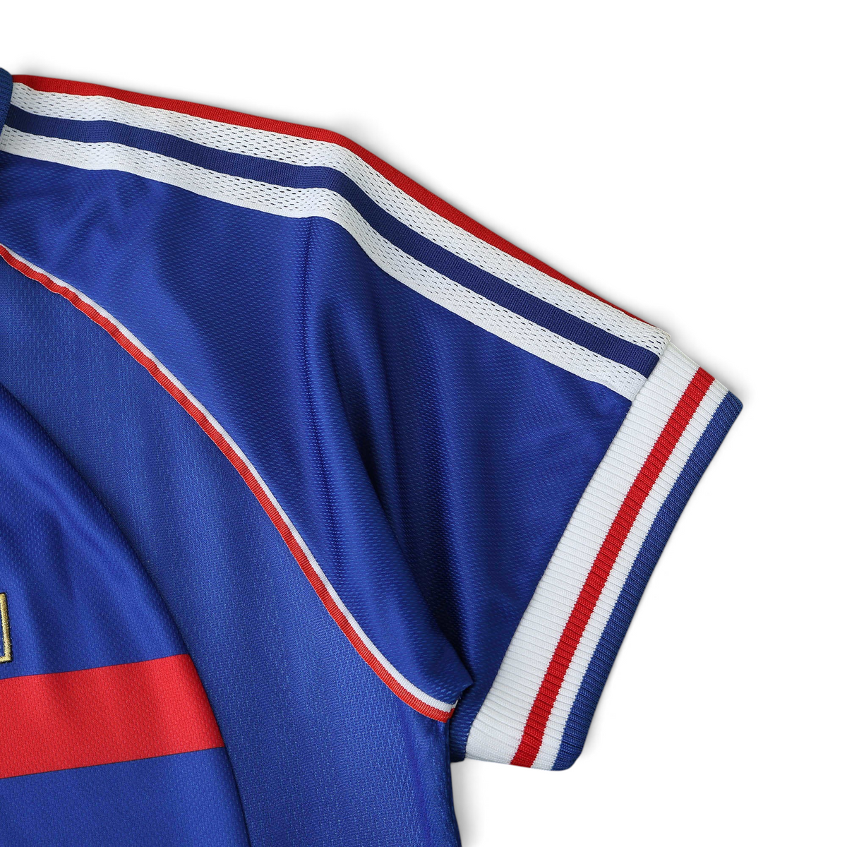 Elite Retro Kits France 1998 World Cup home shirt sleeve detail featuring blue fabric with red and white trim