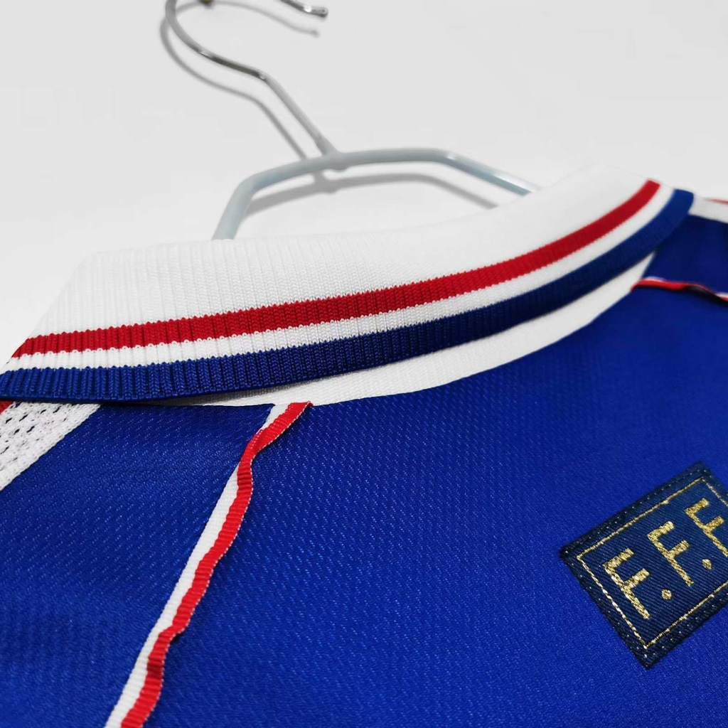 Elite Retro Kits France 1998 World Cup long sleeve home shirt featuring a blue collar with red and white trim