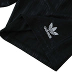 Elite Retro Kits Germany 1990 kids football shorts in black with white embroidered adidas trefoil logo