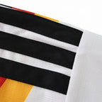 Elite Retro Kits Germany 2026 home kids kit sleeve detail featuring black stripes on white fabric with red and gold