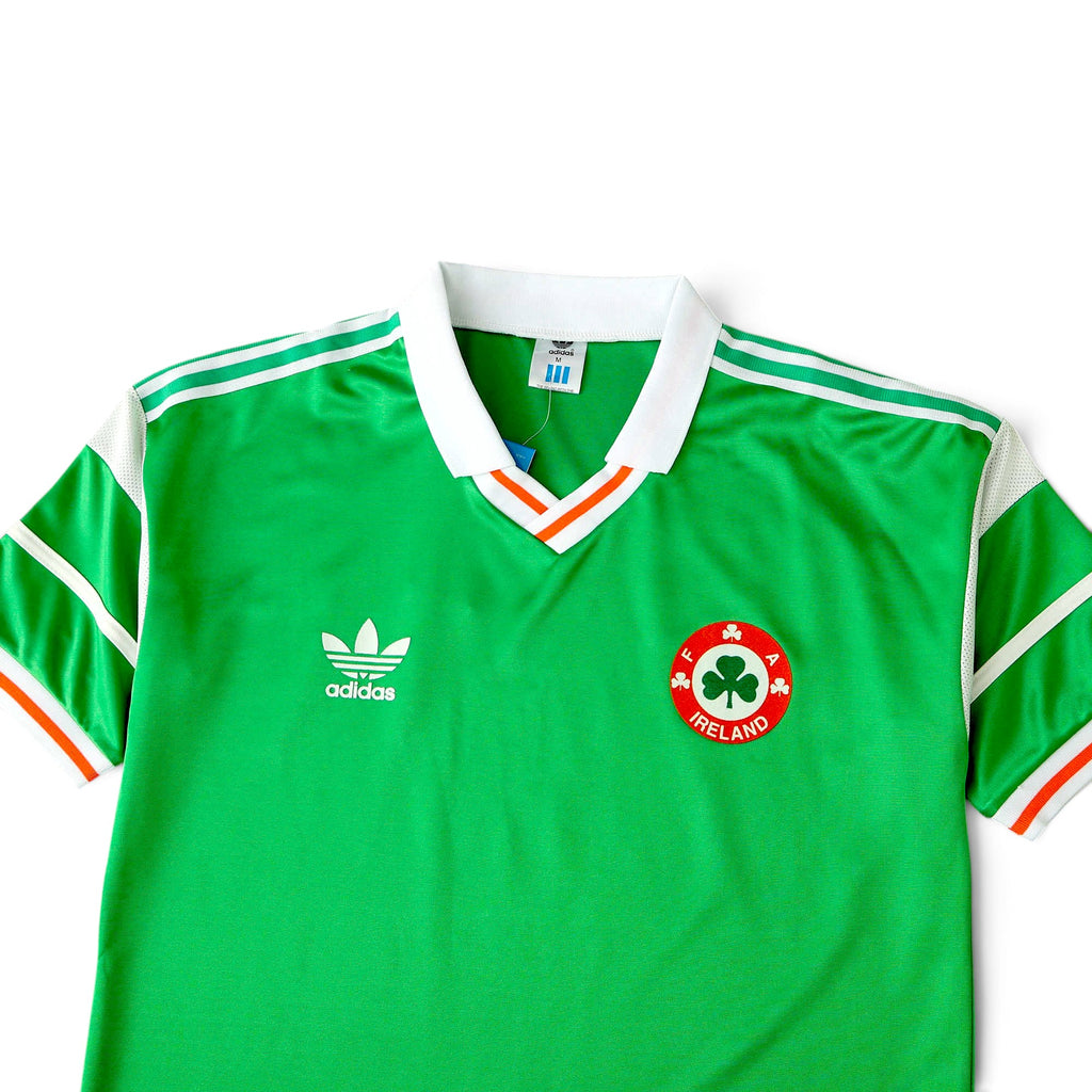 Elite Retro Kits Ireland 1988-90 home football shirt in green with white collar, orange trim, and FAI crest.