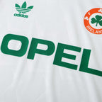 Elite Retro Kits white Ireland 1990 away football shirt featuring green Opel sponsor logo and FAI crest detail