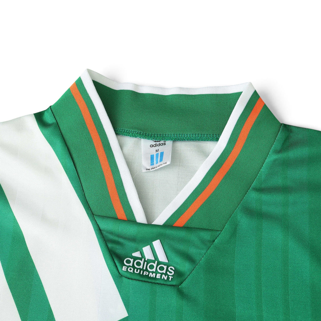 Elite Retro Kits Ireland 1992-94 home football shirt featuring green fabric, white trim, and adidas Equipment branding.