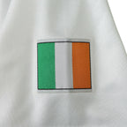 Elite Retro Kits Ireland 1994 away football shirt featuring a detailed embroidered Irish flag patch on white fabric