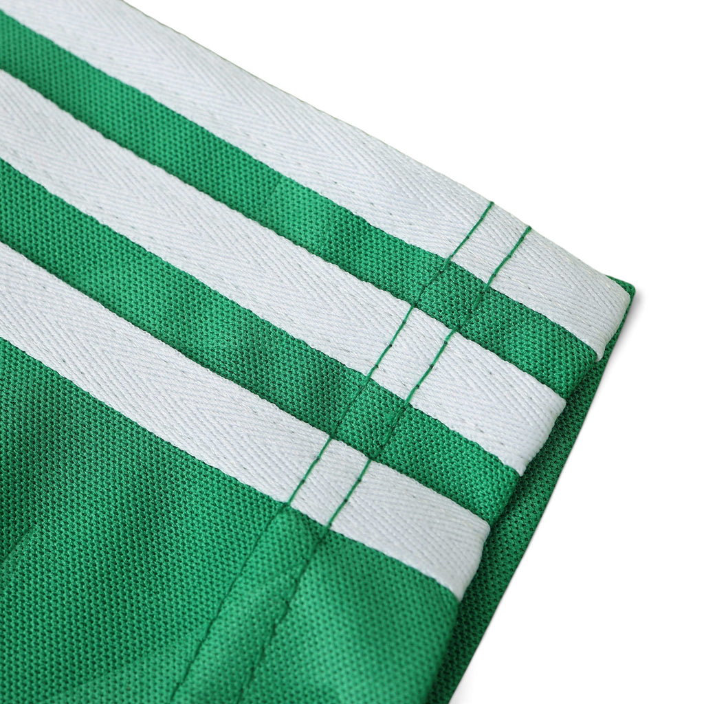 Elite Retro Kits Ireland 1990-92 home football shirt sleeve detail featuring green fabric with white three stripes