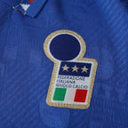 Elite Retro Kits Italy 1994 home football shirt featuring the FIGC crest with three gold stars on blue patterned fabric