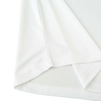 Close-up of the white fabric texture and hem detail on an Elite Retro Kits Italy 1996 away football shirt.