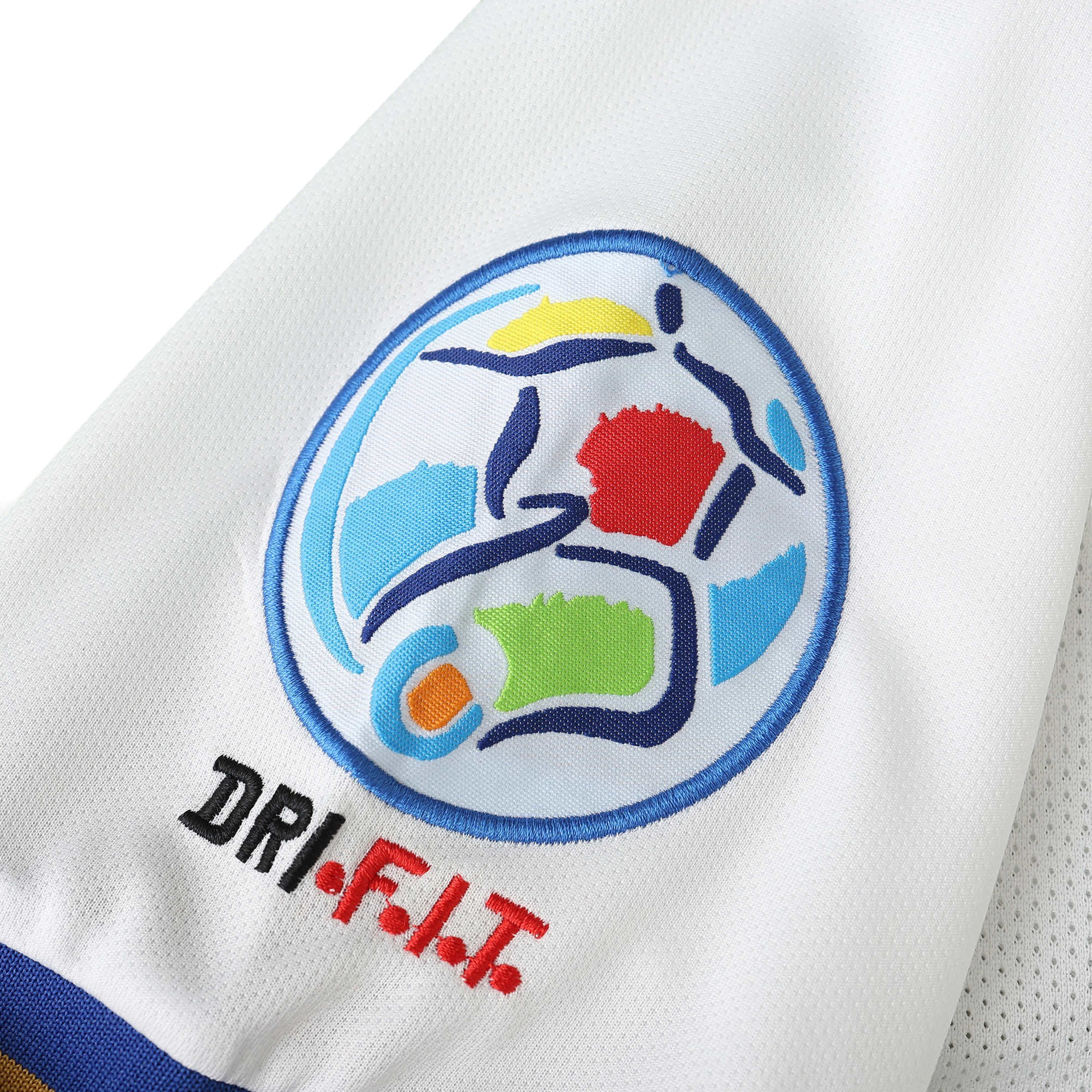 Elite Retro Kits Italy 1996 away shirt sleeve detail featuring the Euro 96 tournament patch and Dri-FIT embroidery.