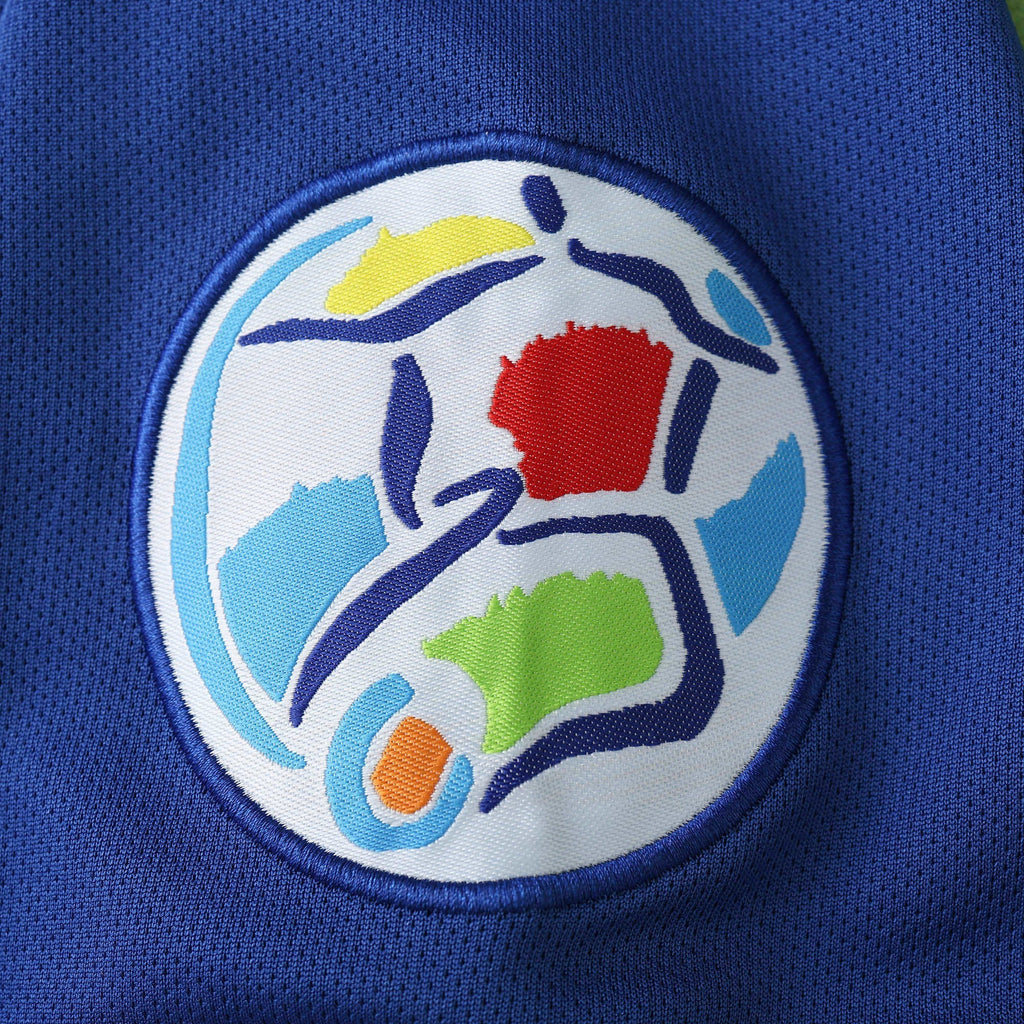 Elite Retro Kits Italy 1996 home shirt featuring a detailed embroidered FIGC crest on classic azzurro blue fabric