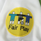 Elite Retro Kits Italy 1996 away shirt featuring a circular yellow UEFA Fair Play patch on white fabric