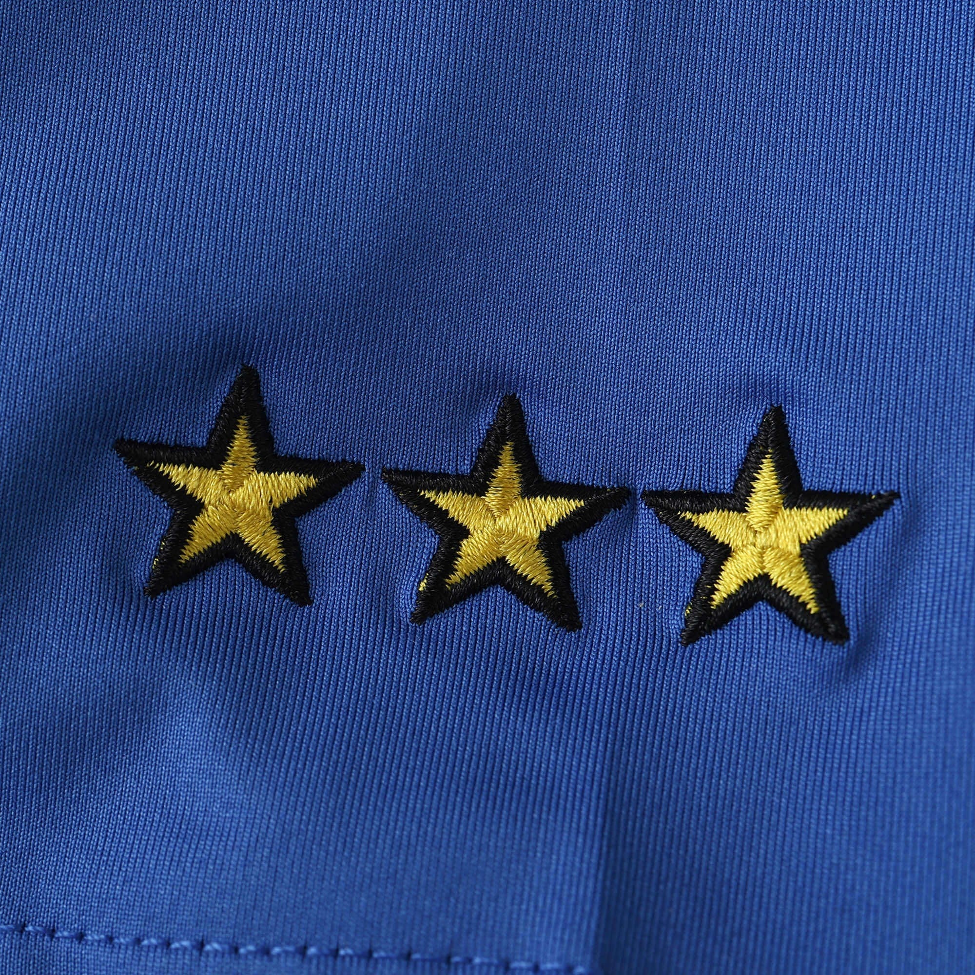 Elite Retro Kits Italy 2000 home shirt detail featuring three embroidered gold stars on deep azzurro blue fabric
