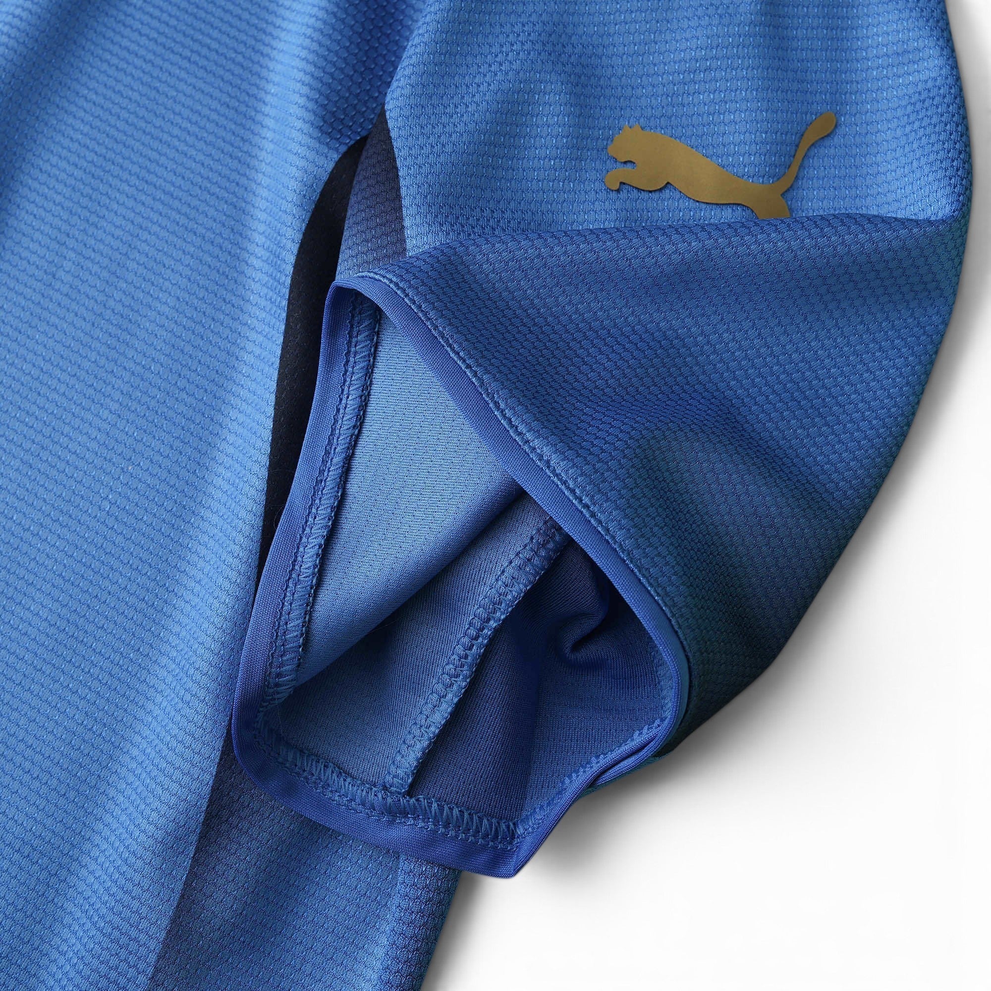 Elite Retro Kits Italy 2006 home shirt in azzurro blue with gold Puma logo detail on the textured fabric sleeve