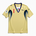 Elite Retro Kits Italy 2006 goalkeeper shirt in gold with navy blue accents, featuring the iconic national team crest.