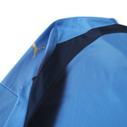 Elite Retro Kits Italy 2006 long sleeve home shirt in azzurro blue with gold Puma logo and dark blue shoulder detail