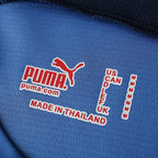 Elite Retro Kits Italy 2006 home shirt inner neck label with Puma logo and size M details on blue fabric