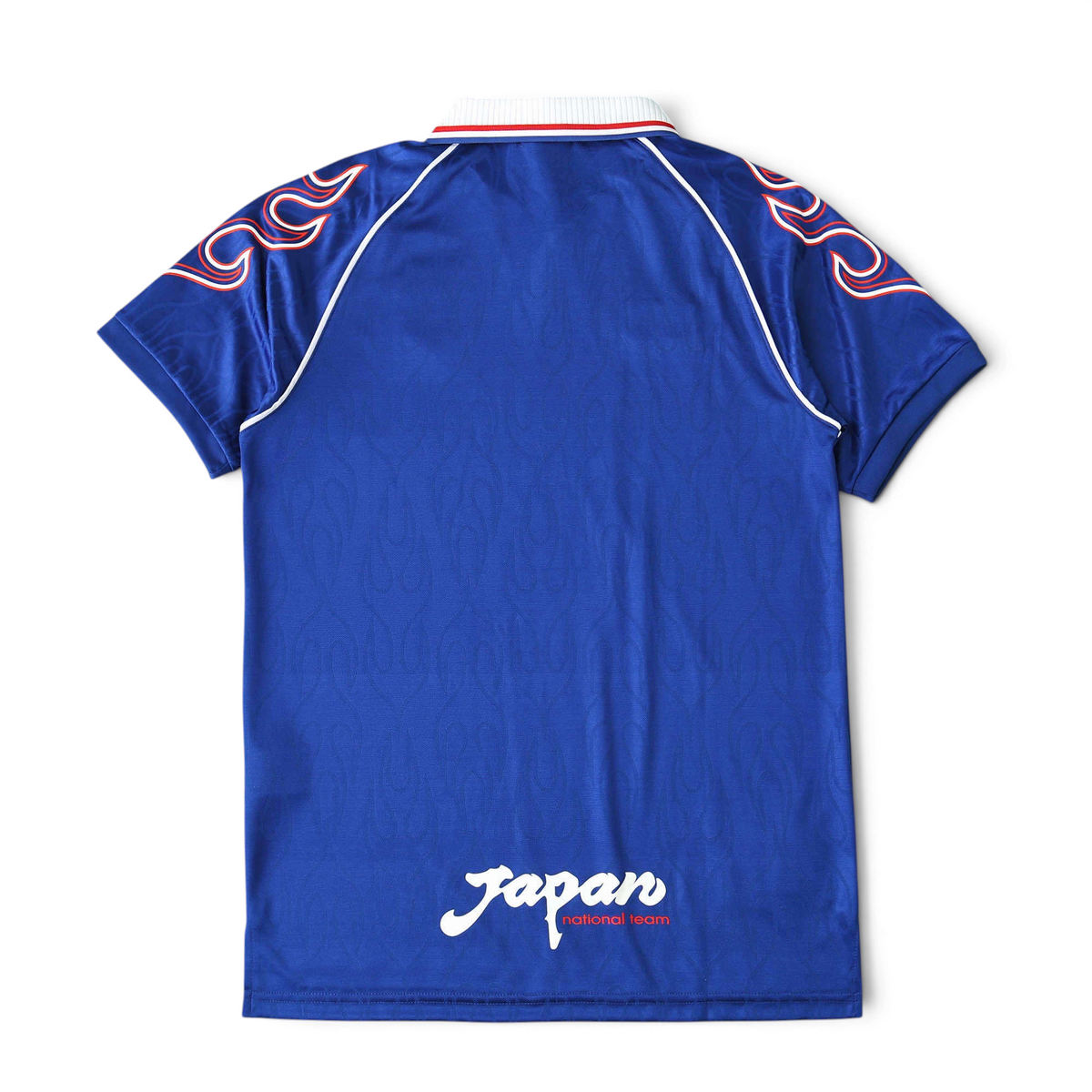 Elite Retro Kits Japan 1998 home football shirt in blue with iconic flame sleeve graphics and white collar, back view.