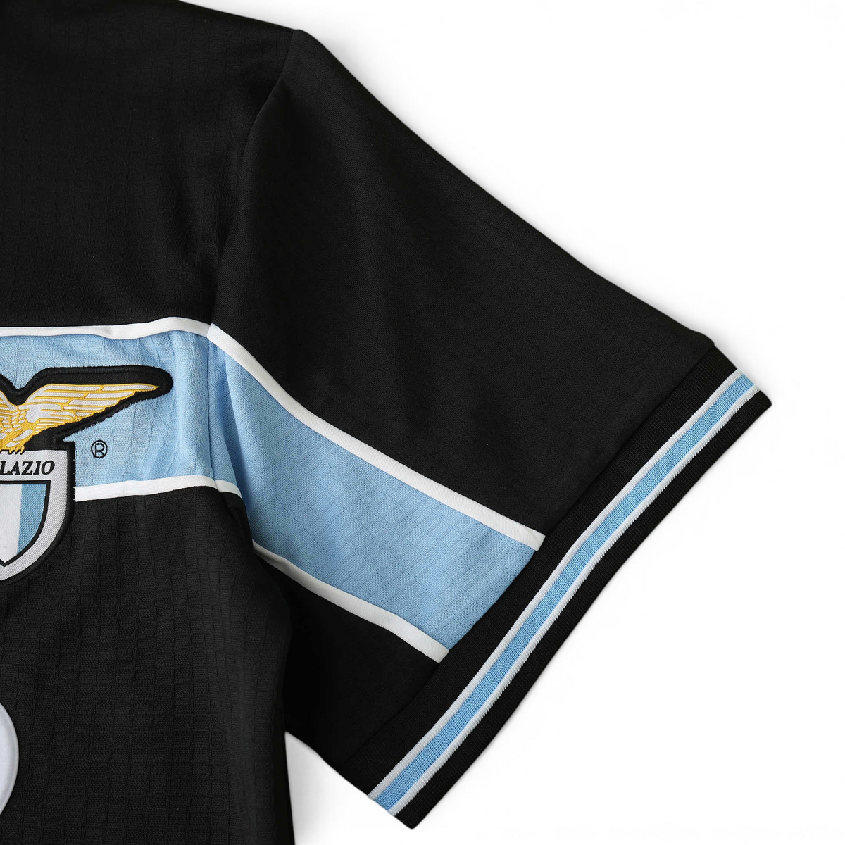 Elite Retro Kits Lazio 1998/99 away football shirt sleeve detail featuring black fabric and sky blue stripe trim