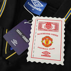 Elite Retro Kits Manchester United 1993-1995 away shirt with Umbro branding and official product tags