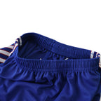 Elite Retro Kits kids Manchester United 1990-92 away kit blue shorts with elasticated waistband and striped trim