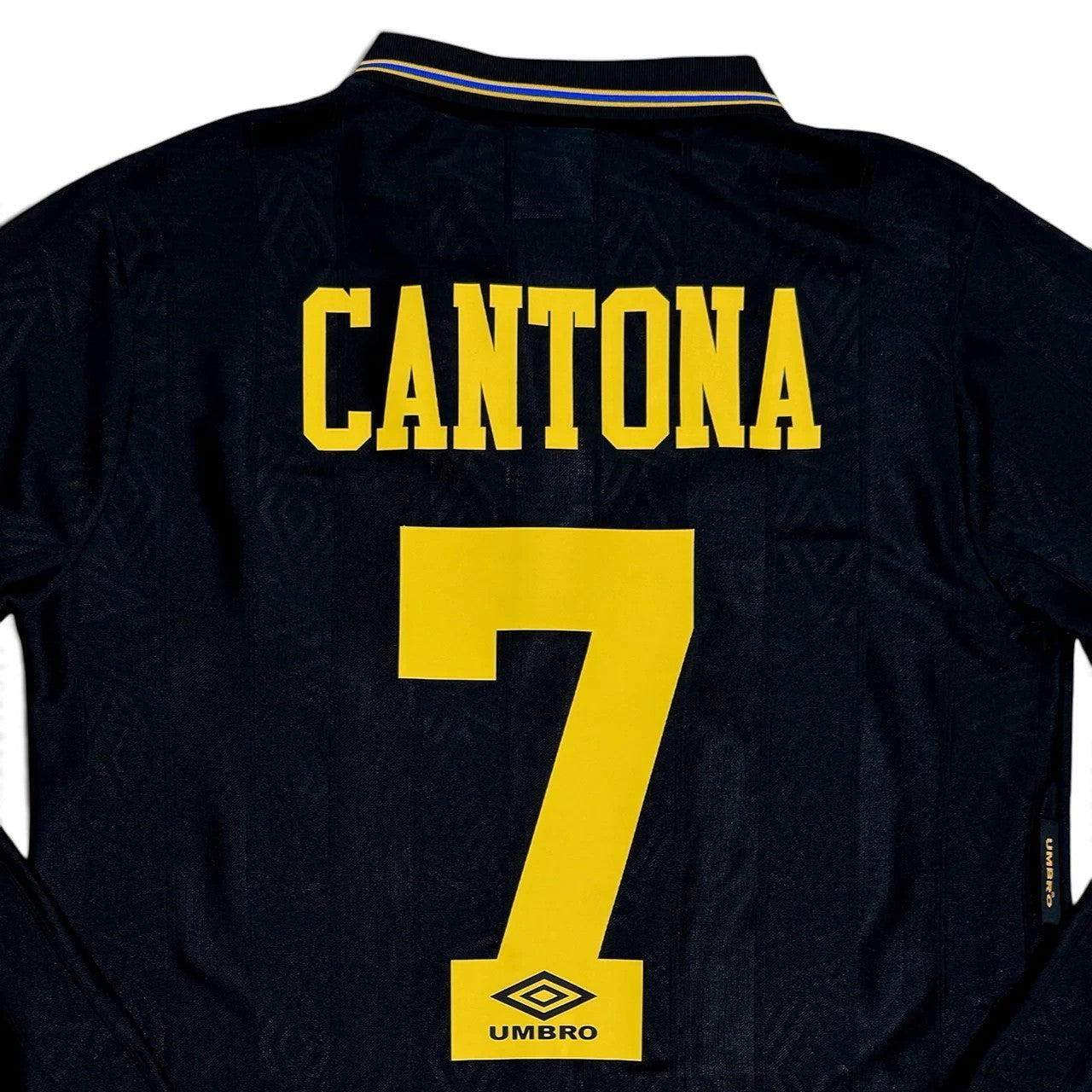 Elite Retro Kits Manchester United 1993-95 away shirt in black with yellow Cantona 7 lettering and Umbro branding