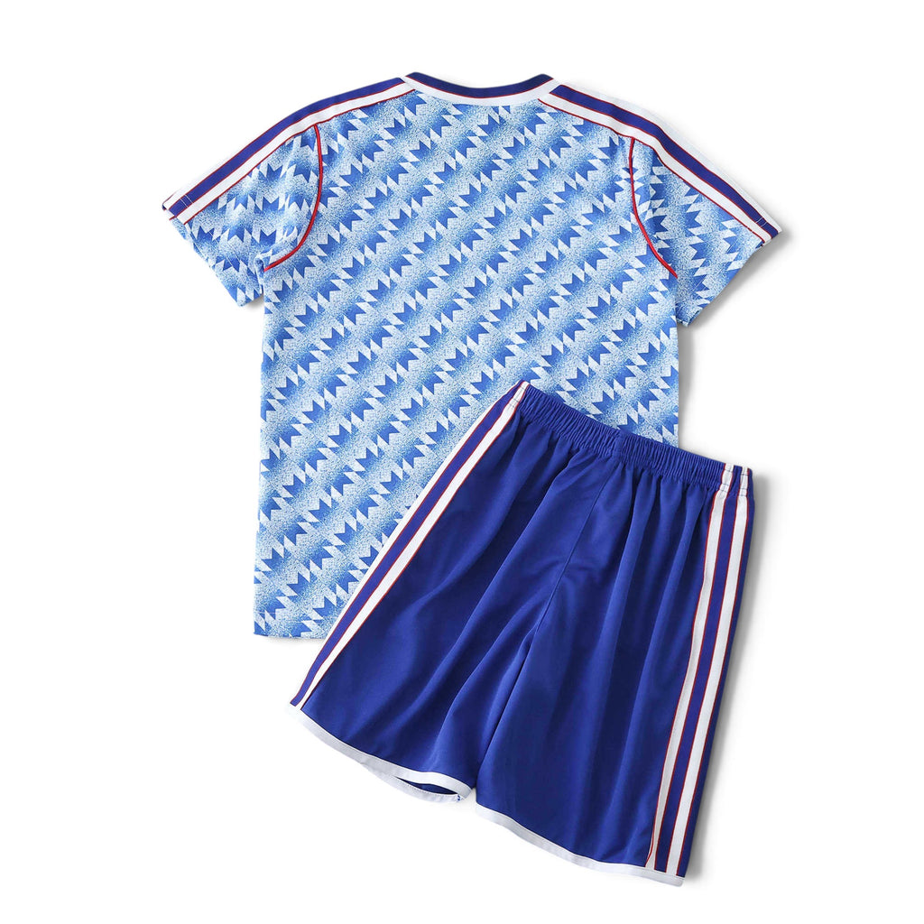 Elite Retro Kits Manchester United 1990/92 away kids kit featuring blue patterned jersey and matching blue shorts.