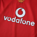 Elite Retro Kits Manchester United 2005/06 kids home shirt featuring the iconic red fabric and Vodafone sponsor logo