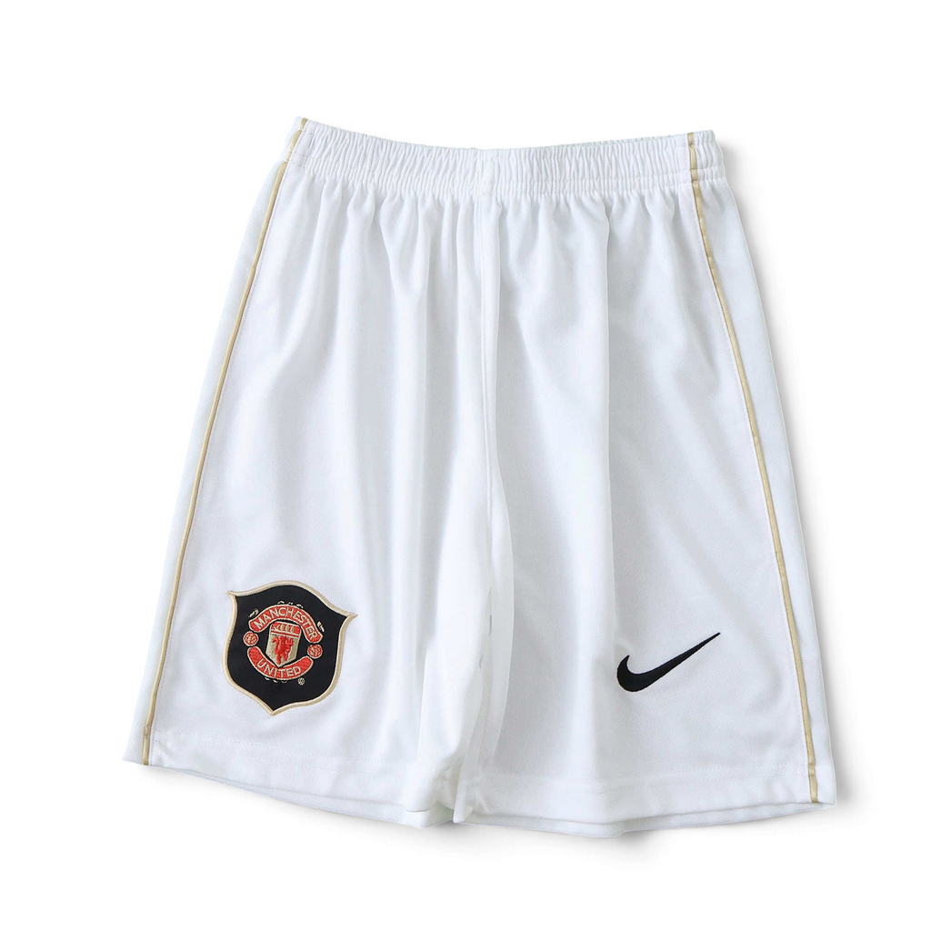 Elite Retro Kits Manchester United 2006/07 kids home shorts in white with club crest and Nike logo