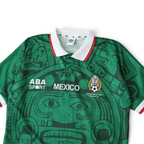 Elite Retro Kits Mexico 1998 home football shirt in green with Aztec pattern, white collar, and FMF crest detail.