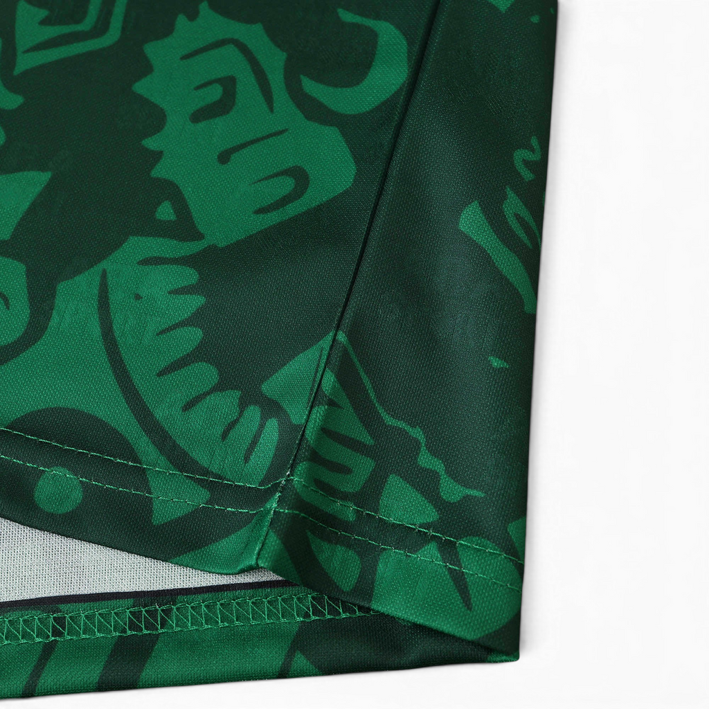Elite Retro Kits Mexico 1998 home football shirt featuring a detailed green and black Aztec-inspired graphic pattern.