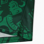 Elite Retro Kits Mexico 1998 home football shirt featuring a detailed green and black Aztec-inspired graphic pattern.