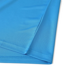 Close-up of the sky blue textured fabric of an Elite Retro Kits Napoli 1987/88 home football shirt