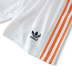 Elite Retro Kits Netherlands 1988 kids home shorts in white with orange side stripes and black adidas trefoil logo