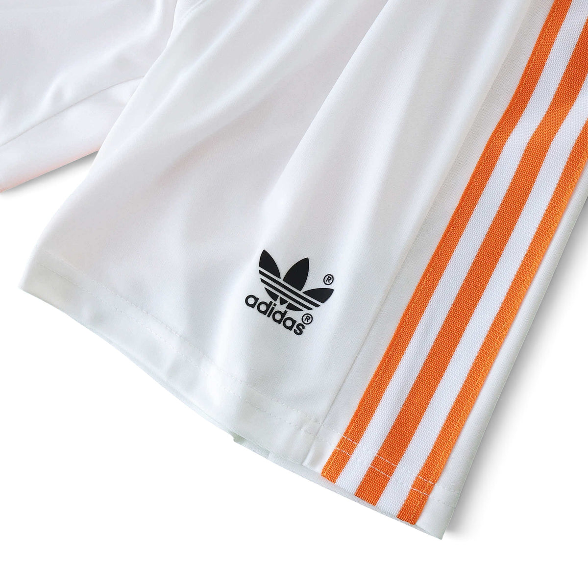 Elite Retro Kits Netherlands 1988 kids home shorts in white with orange side stripes and black adidas trefoil logo