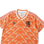 Elite Retro Kits Netherlands 1988 home football shirt in orange with geometric print, KNVB lion crest, and wing collar.