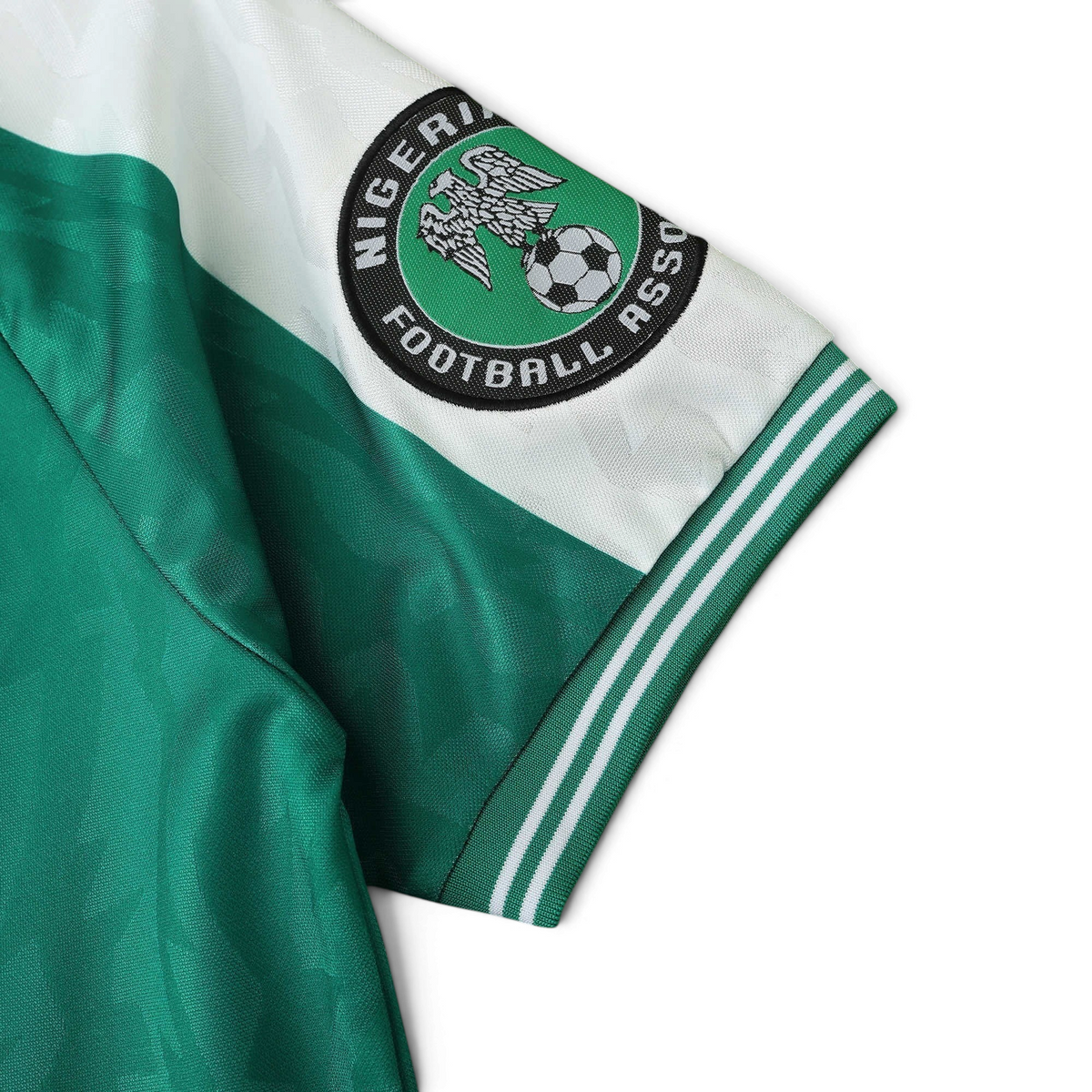 Elite Retro Kits Nigeria 1996 home football shirt sleeve featuring the Nigeria Football Association crest