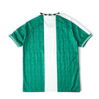 Back view of the Elite Retro Kits Nigeria 1996 home football shirt featuring a green pattern and white central stripe.
