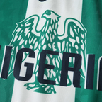 Elite Retro Kits Nigeria 1996 home football shirt featuring green and white panels with the national eagle crest