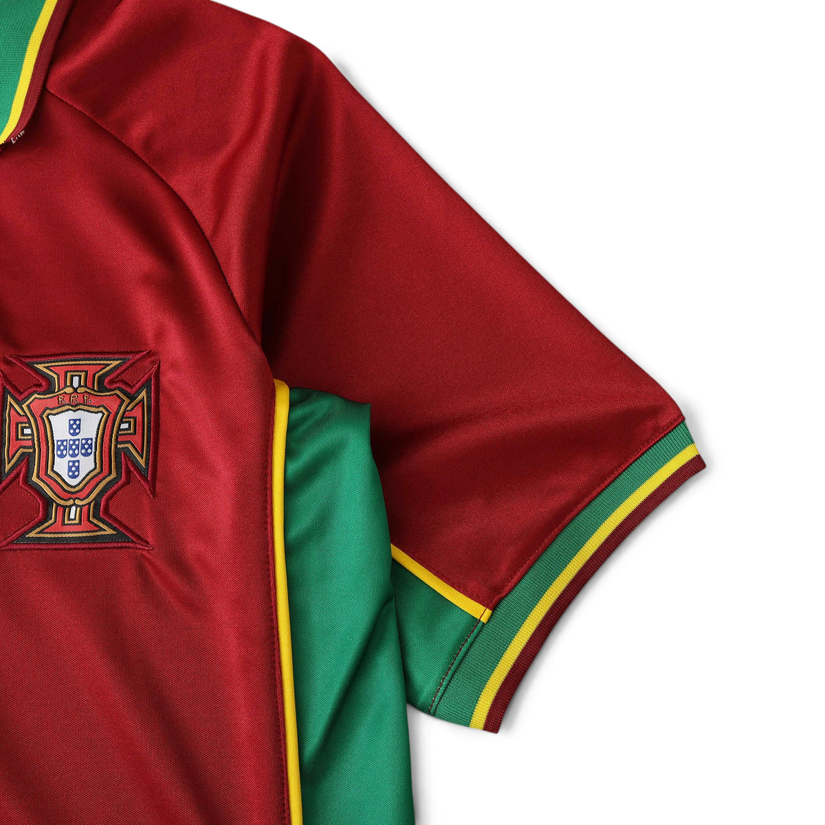 Elite Retro Kits Portugal 1998 home football shirt in red with green sleeves, yellow trim, and embroidered FPF crest.