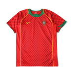 Elite Retro Kits Portugal 2004 home football shirt in red with green trim and the FPF crest on a green pitch background