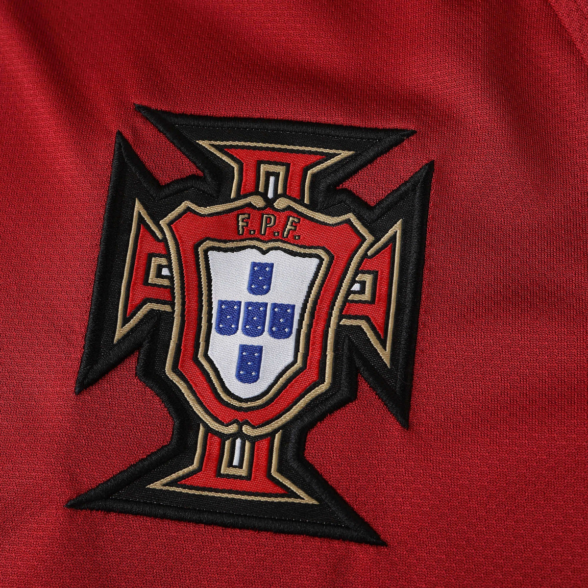 Elite Retro Kits Portugal 2006 home shirt featuring the embroidered FPF crest on classic red fabric