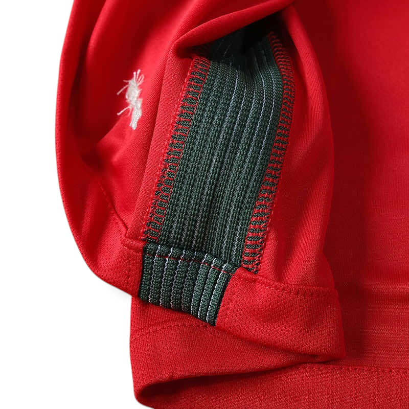 Elite Retro Kits Portugal 2016 home football shirt detail showing red fabric and dark green side ventilation panel